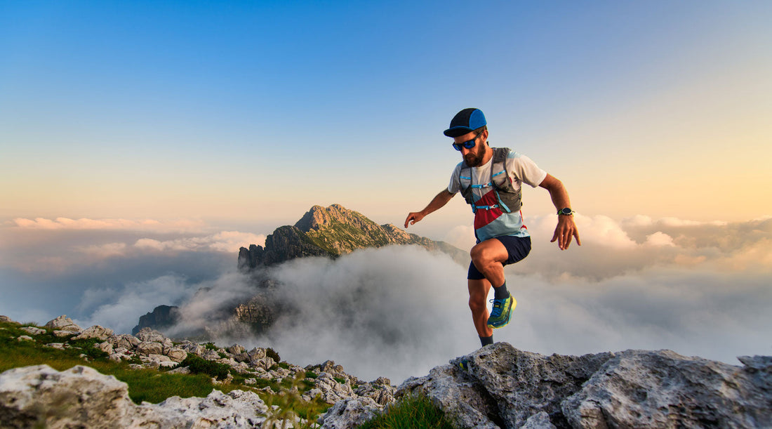 Trail runner wearing merino wool socks on a mountain run.
