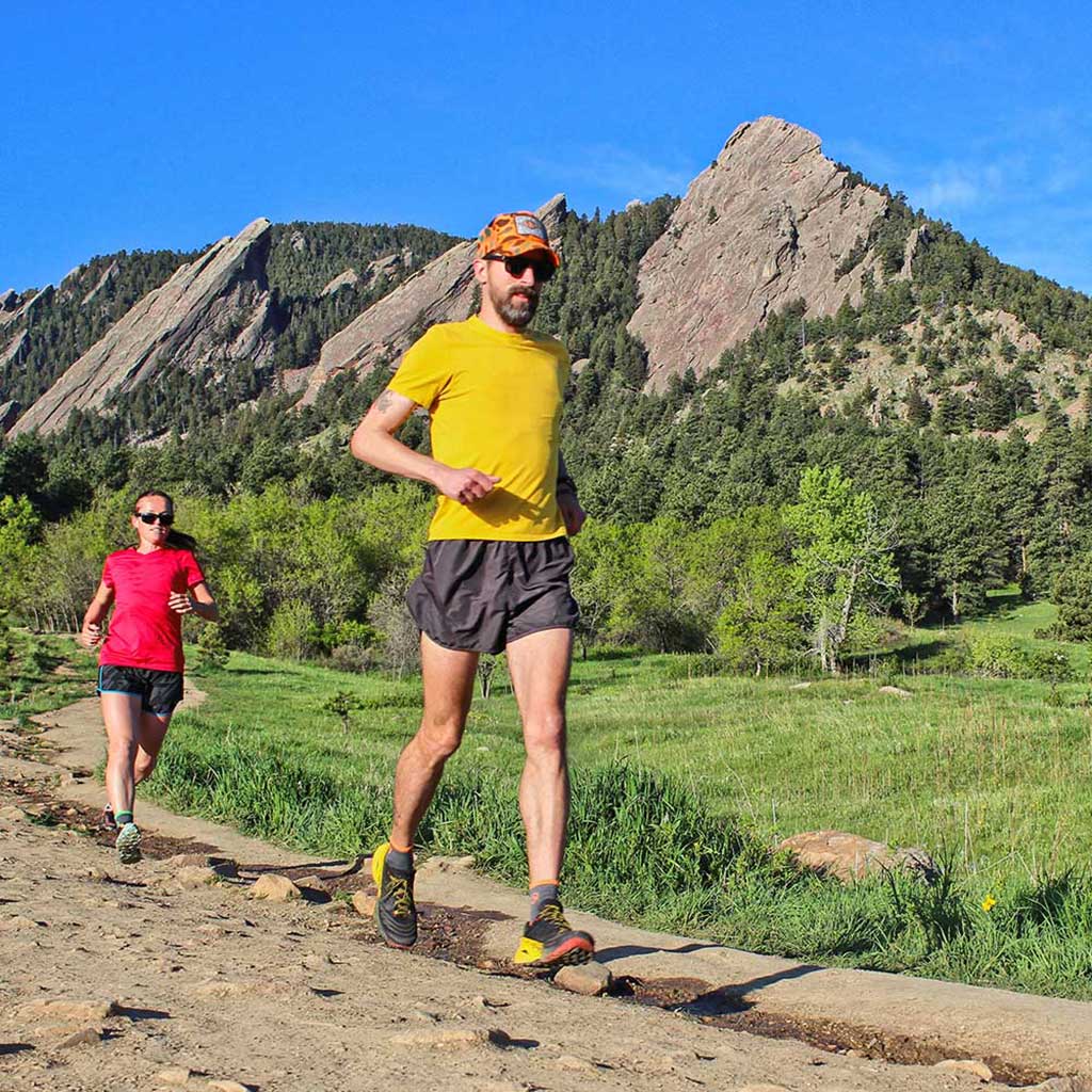 A couple of trail runners wearing Cloudline merino wool running socks.