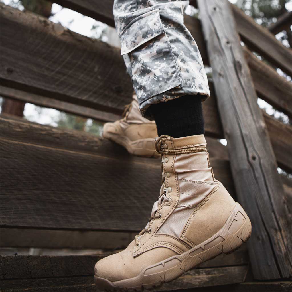 Women wearing Cloudline tactical socks while on obstacle course. 