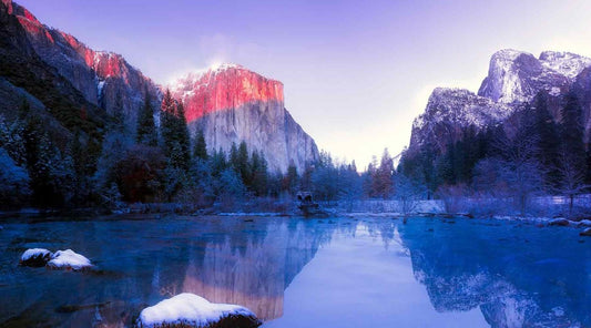 Winter view of a lake with mountains in the distance at a National Park.