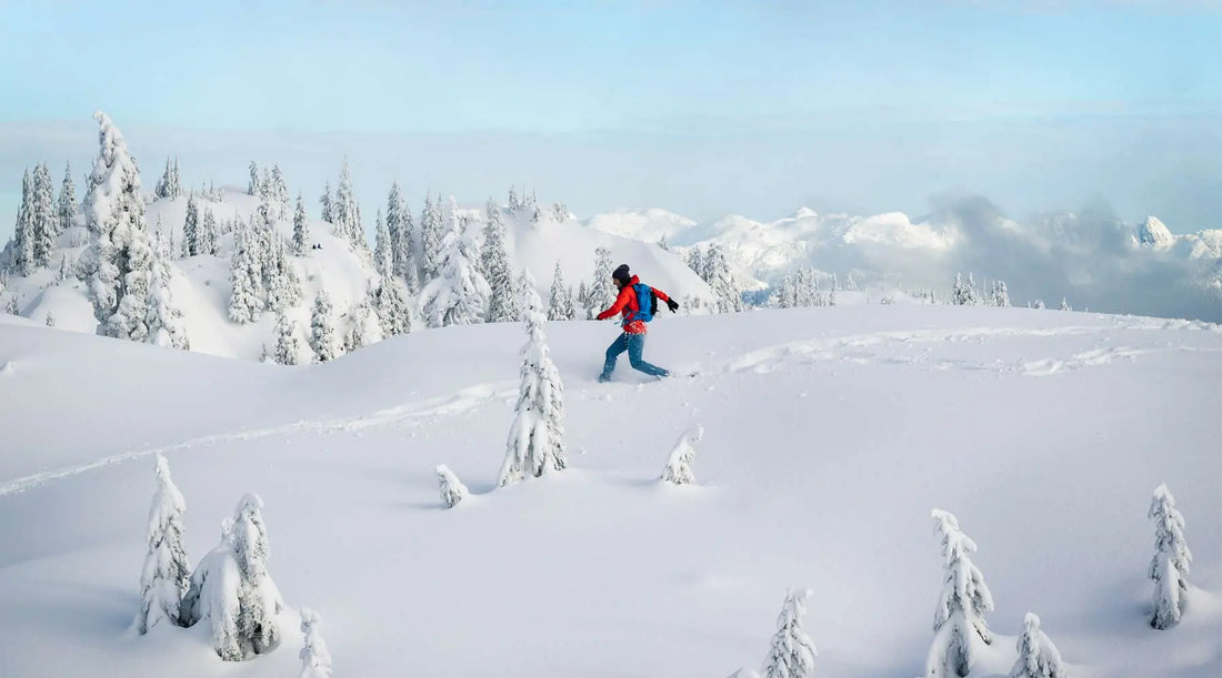 Snowy adventure: Hiker embarking on a trek through the winter landscape.