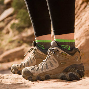Women standing on rocky trail wearing Cloudline 1/4 socks.