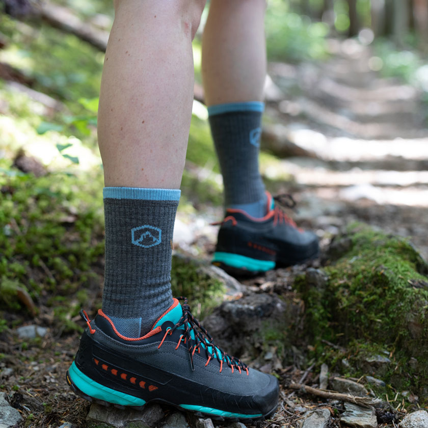 Hiker wearing Cloudline socks on the trail.