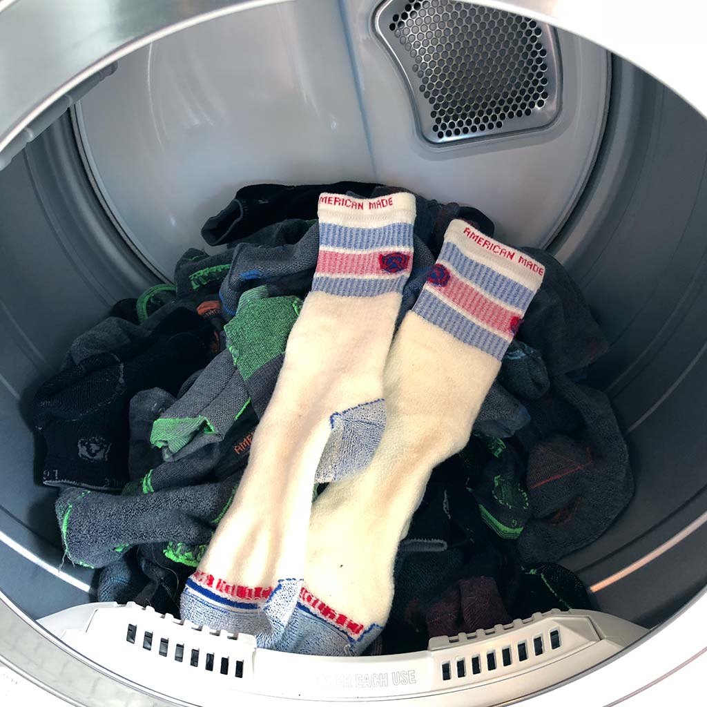 Cloudline socks in the dryer. 